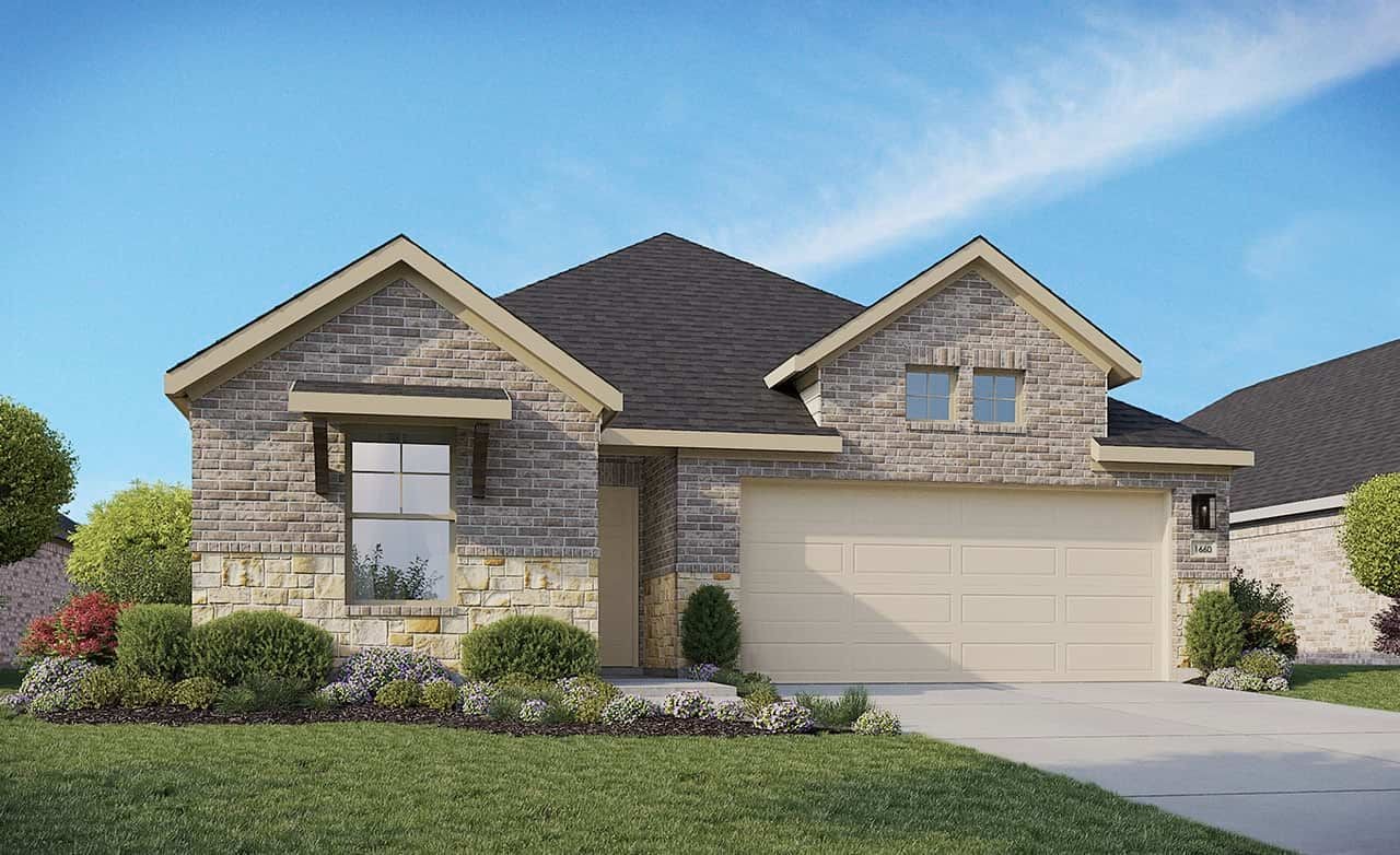 Stone-built modern house with peaked roof and landscaped yard in Bermuda at Sunflower Ridge. Prominent garage.
