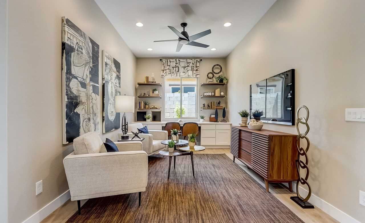 Modern Living Room Design in Canyon Views Hacienda Community Elegant living room with abstract art, modern fan, Canyon Views, Hacienda community.