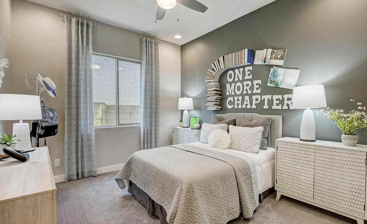 Mirada Crossing Bedroom with Book-themed Decor Elegant bedroom in Mirada Crossing with book-themed wall art and contemporary decor.